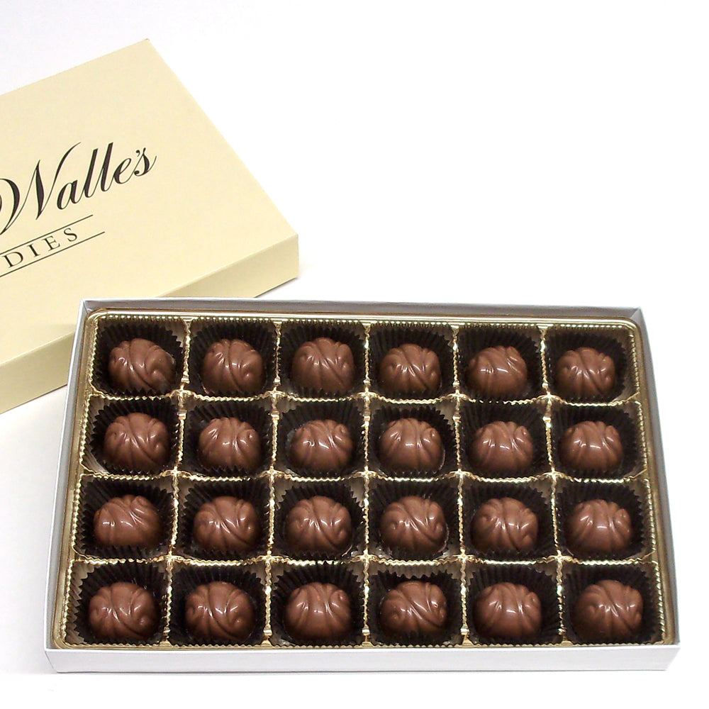 Box of 24 rounded dome shaped chocolates with the Vande Walle Candies brand name on a white background.